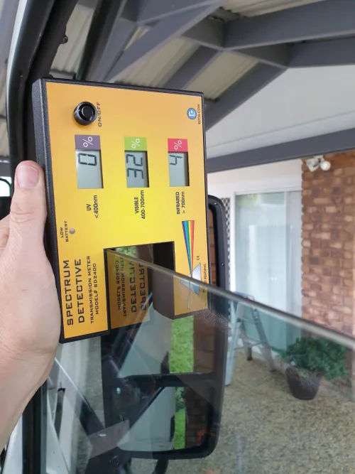 Testing tint on car in Ormiston