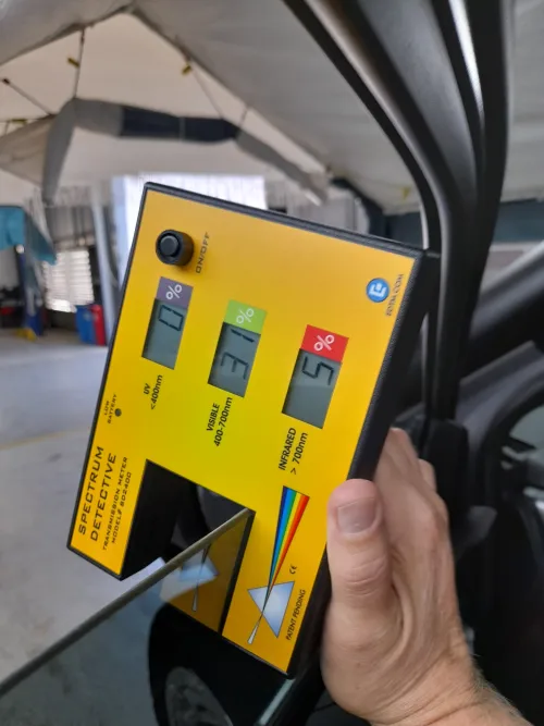 Ultragard 40 ceramic window tint reading on a car in Cleveland